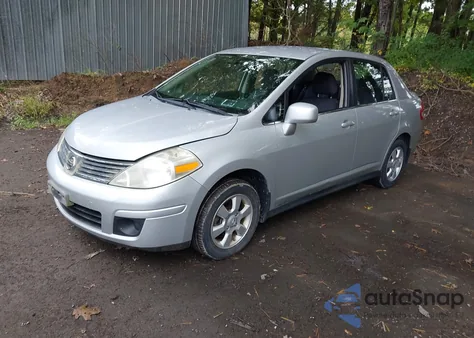 2007 Nissan Versa 1.8Sl z USA, uszkodzony, nr VIN 3N1BC11E27L401016